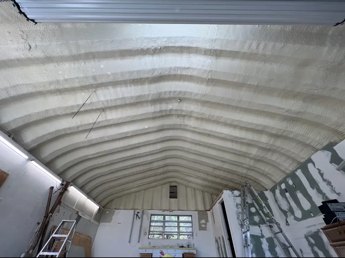 Spray polyurethane foam applied to the underside of a metal roof deck in Mount Hope